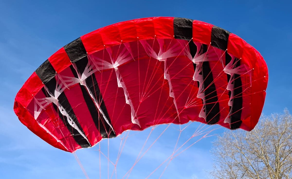 Rider using Freefly parawing for smooth foil riding and downwind performance